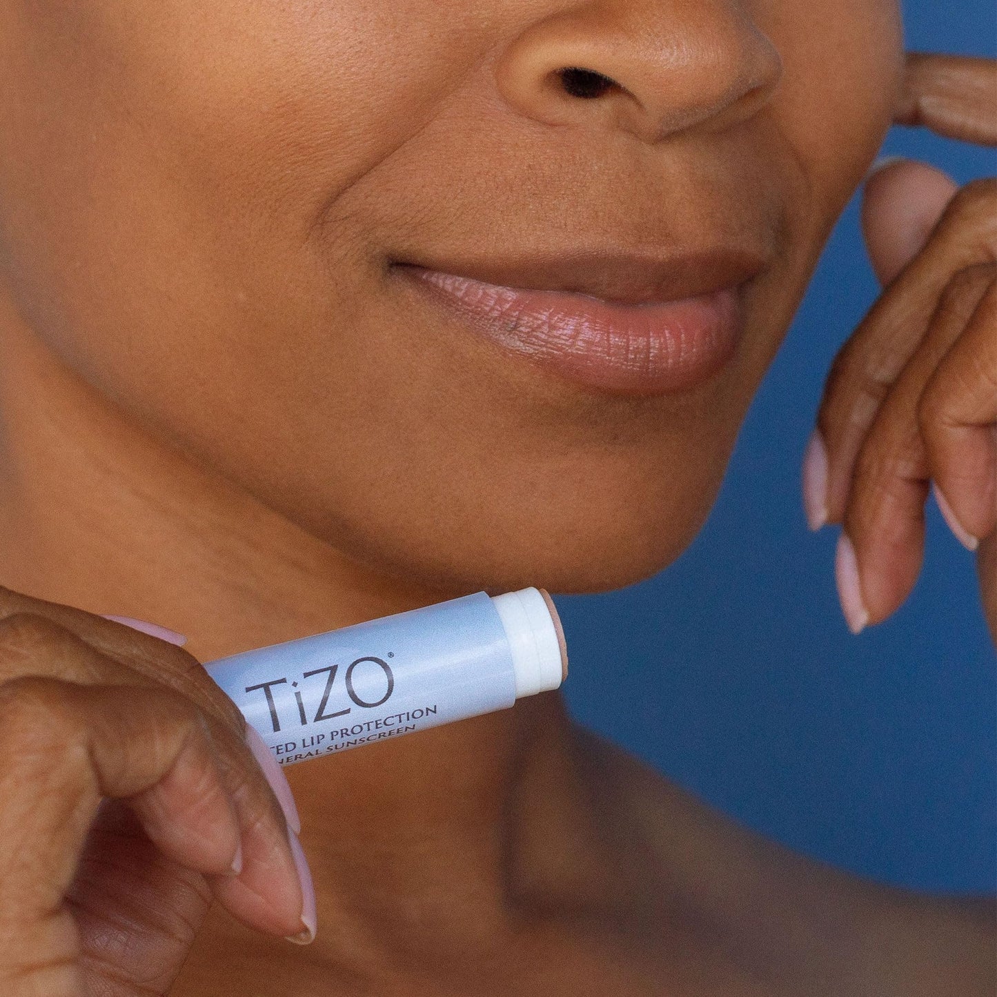 TiZO Lip Protection | Tinted | Broad Spectrum Sunscreen | UVA/UVB Protection | For all skin types | Titanium Dioxide and Zinc Oxide | 0.14 oz / 4.5 g