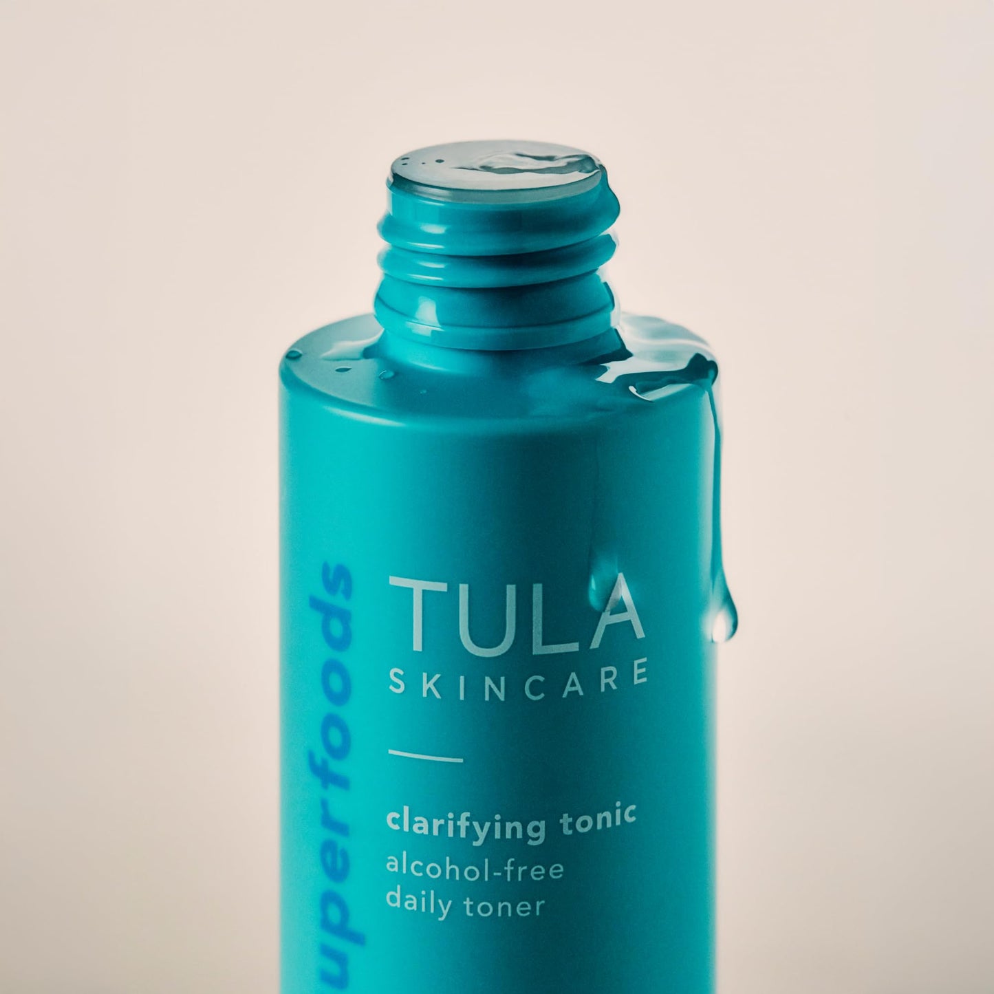 TULA Skin Care Mini Clarifying Tonic Alcohol-Free Daily Toner - Travel Face Toner to Gently Exfoliate and Tighten Pores, Contains Witch Hazel and Niacinamide, 0.68 Fl Oz.