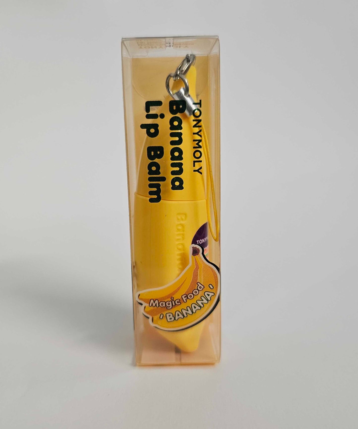 TONYMOLY Magic Food Banana Mini Lip Balm, Hydrating & Moisturizing Korean Lip Care with Shea Butter & Vitamin E, Travel Size, Fruit-Infused Lip Treatment