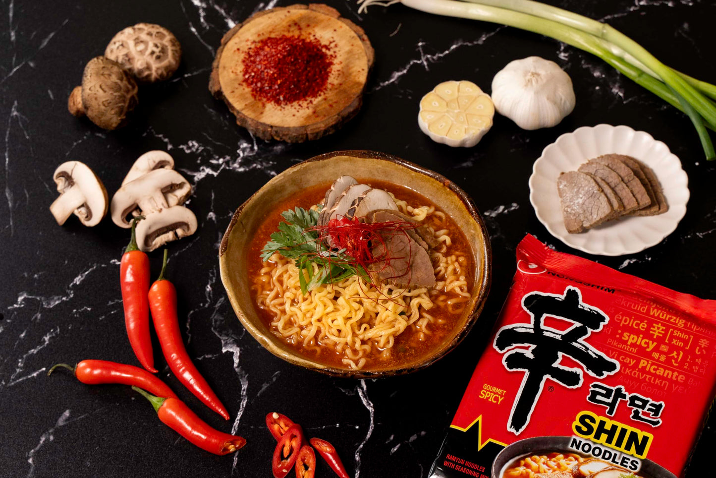 Nongshim Shin Ramyun Noodles, Spicy Korean Signature Instant Ramyun, Rich Beef Flavored Broth, Microwaveable, Korean Instant Noodles, 4.23 oz (Pack of 20), Packaging May Vary.