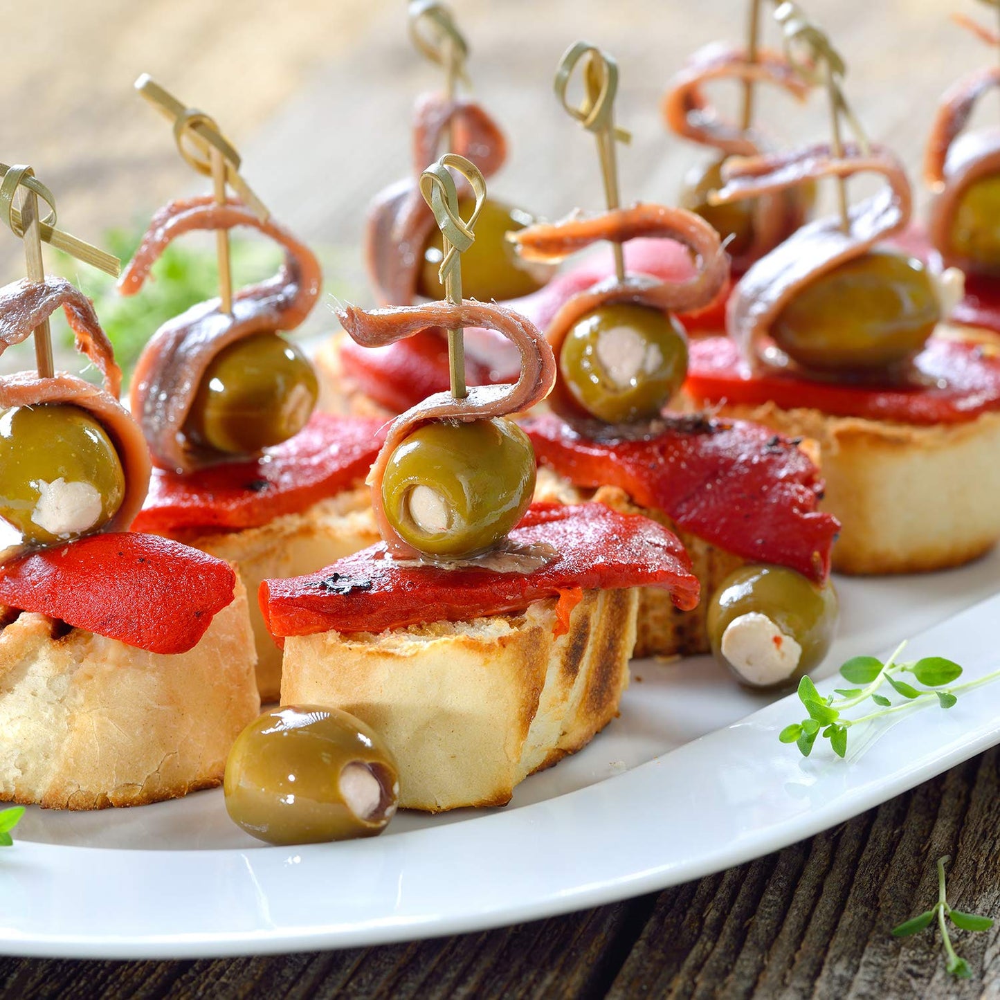 Sanniti Olives stuffed with Anchovies, 15.9 oz (Pack of 2)