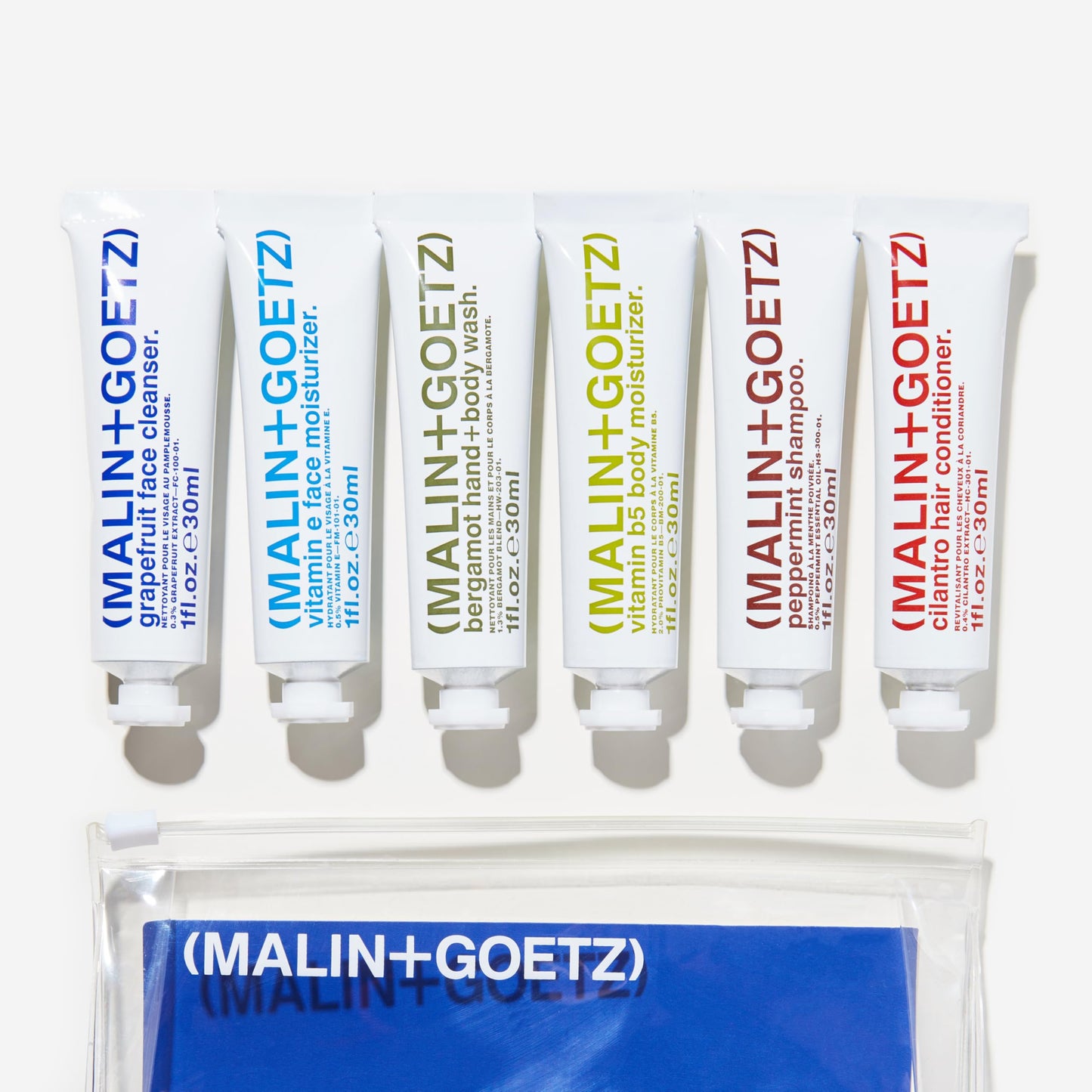 MALIN+GOETZ Best-Sellers Travel Kit | Six Everyday Essentials for Face, Body + Hair | Grapefruit Face Cleanser, Vitamin E Face Moisturizer, Peppermint Shampoo + More | Vegan, Travel-Friendly(6 x 1 oz)